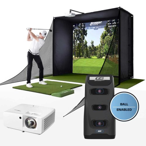 A golfer swinging in a PlayBetter SimStudio home golf simulator with a projector and Foresight Sports launch monitor in the foreground with a 